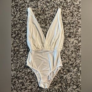 White sleeveless bodysuit size small